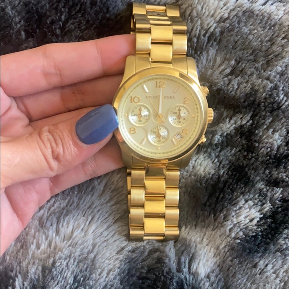 Gold Micheal Kors watch